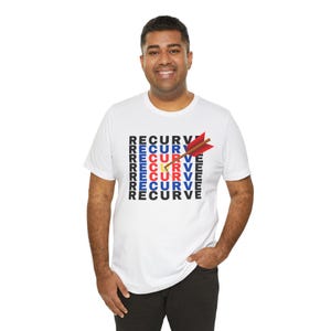May include: White t-shirt with the word "RECURVE" stacked vertically in black, blue, red, and yellow. A red arrow with a brown shaft is piercing the word. The shirt is a casual wear item.