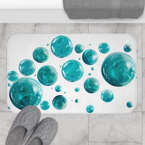 Modern Bubble Bath Mat - non-slip bath mat featuring aqua blue 3D bubble design on white background - Printed in USA