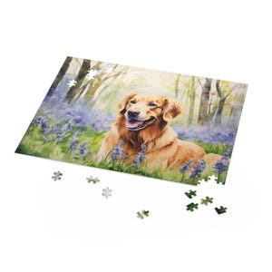 Golden Retriever Jigsaw Puzzle (120, 252, 500-Piece) - golden retriever sitting happily among a field of delicate bluebells - Printed in USA