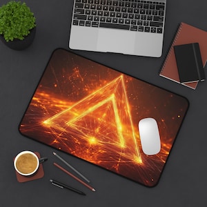 May include: A black mousepad with a glowing orange triangle design. The triangle is made up of lines of light and appears to be floating above a dark, textured surface.