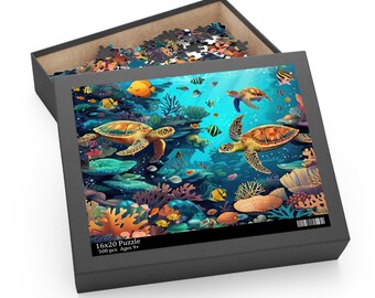 May include: A 500 piece jigsaw puzzle featuring a colorful underwater scene with sea turtles, coral reefs, and fish. The puzzle box is black with the text "16x20 Puzzle 500 pcs Ages 9+"