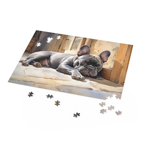 Rompecabezas de un bulldog francés durmiendo en la nieve (120, 252 y 500 piezas): acuarela de un bulldog francés dormitando. Impreso en EE. UU.