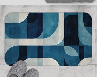 Blue Geometric Art Bath Mat - non-slip bath mat featuring bold geometric shapes in rich shades of navy, teal, and ivory - Printed in USA