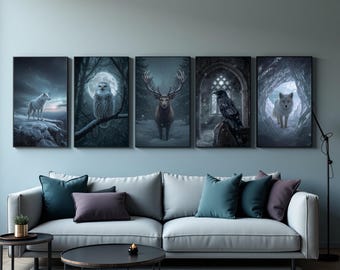 May include: Five framed art prints featuring wildlife scenes. The prints depict a wolf on a cliff, an owl on a branch, a deer in a snowy landscape, a raven on a stone, and a wolf in a cave. The art has a dark, moody aesthetic.