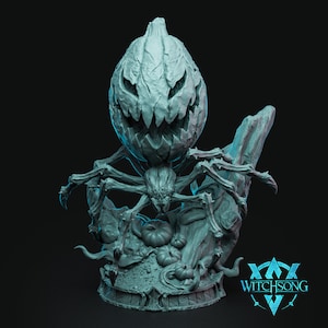 May include: A gray, detailed, 3D printed sculpture of a pumpkin-headed spider with a menacing grin. The spider is perched on a gnarled tree stump with smaller pumpkins scattered around the base. The sculpture is labeled "Witchsong" at the bottom.
