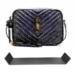 May include: A black quilted shoulder bag with a gold YSL logo. The bag has a flap closure and a chain strap.