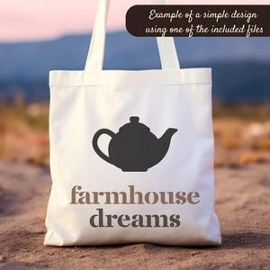 May include: A white tote bag with a black teapot silhouette and the words "farmhouse dreams" in a brown font. The bag has long handles and the text "Example of a simple design using one of the included files" is at the top.