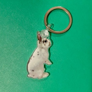 Cute acrylic white spotted bunny standing keychain