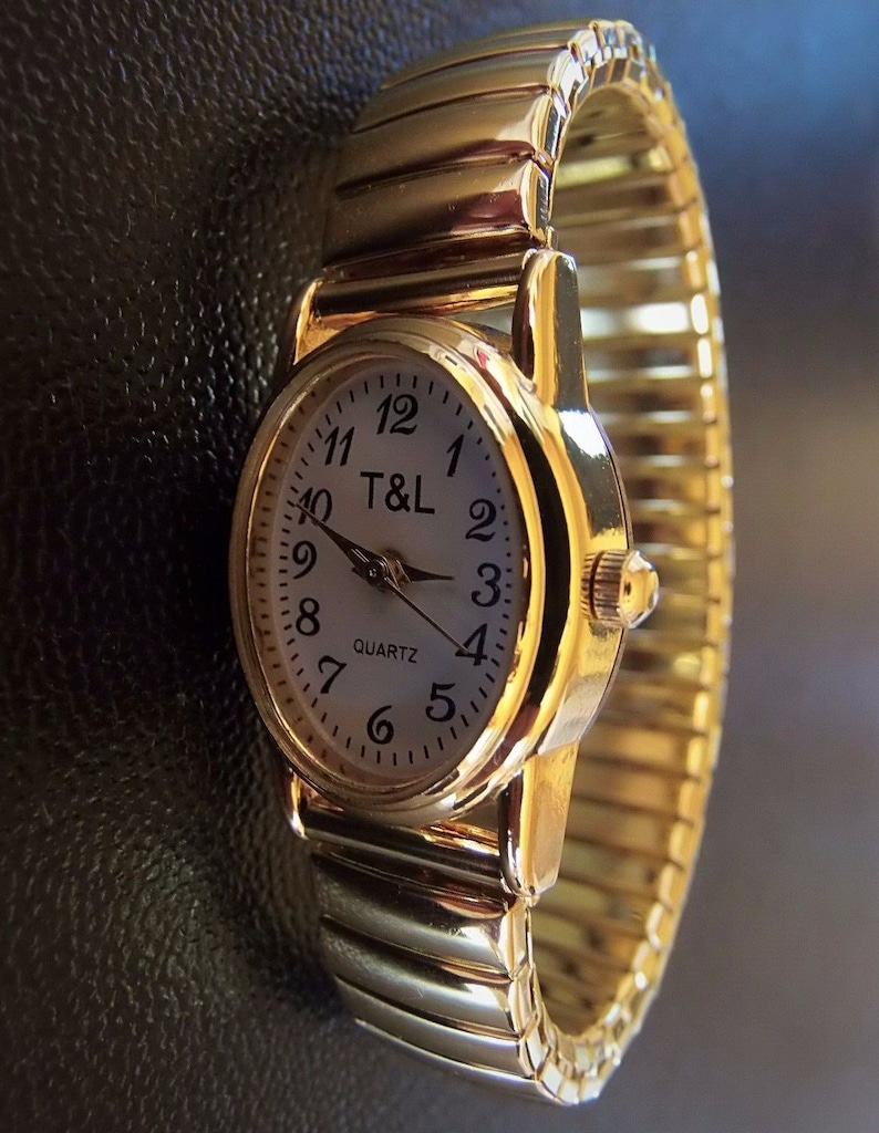 Quarz Uhr Zugband Stretch Armband Edelstahl Batterie Stretcharmband gold Damen Mädchen unisex flexibles Armband geprüft & neu Armbanduhr Bild 1