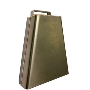 May include: A brass cowbell with a silver handle. The bell is slightly tarnished and has a worn look.