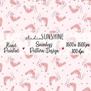 May include: A hand-painted seamless pattern design featuring watercolor illustrations of pink shrimp and small hearts on a light pink background. The design includes the text "studio SUNSHINE" and "Seamless Pattern Design". The image resolution is 3500 x 3500 px at 300 dpi.