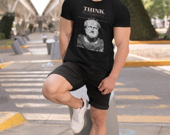 May include: A black t-shirt with a white graphic of a bust of a man with the text "THINK ABOUT IT" above the bust.