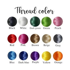 May include: A chart of thread colors with the text "Thread color" at the top. The colors include black, white, dark green, green, peach, red, pink, brown, beige, gray, blue, dark blue, purple, yellow, and orange.