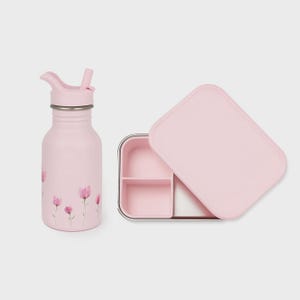 May include: A pink insulated water bottle with a straw and a matching pink lunchbox. The bottle features a floral design with pink flowers. The lunchbox has two compartments and a pink lid.