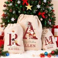 Personalized Santa Sack, Large Christmas Sack, Personalized Christmas Toy Sack with Name Initial, Christmas Gift Bags, First Christmas Gifts product logo