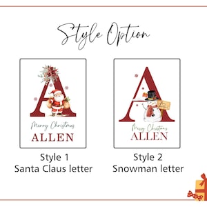 Puede incluir: Dos impresiones rectangulares etiquetadas como Style Option. El estilo 1 presenta una letra A roja grande con Santa Claus, detalles florales y el texto Merry Christmas ALLEN. El estilo 2 presenta una letra A roja grande con un mu&ntilde;eco de nieve.