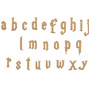 May include: A complete set of lowercase alphabet letters from a to z, crafted from light brown wood. Each letter features a distinct, angular, and stylized font design, with the letters p and q displaying elongated, lightning-bolt-like descenders.