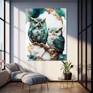 May include: Two owls with gold and teal accents perched on a branch with a marble and gold background.