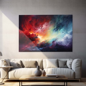 May include: Abstract art print featuring a colorful, swirling cloud formation with shades of red, orange, yellow, blue, and purple. The clouds appear to be moving and swirling, creating a sense of energy and movement.