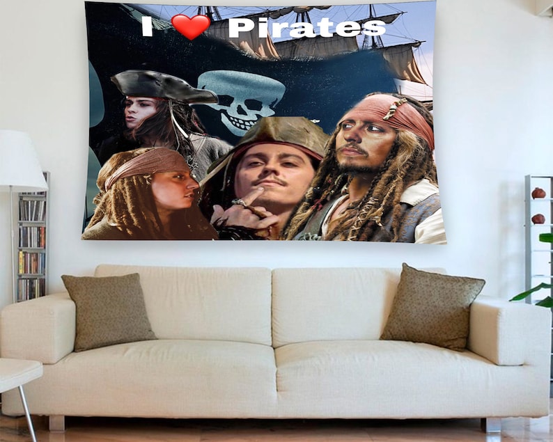 May include: A tapestry featuring a collage of characters from the Pirates of the Caribbean movie franchise. The tapestry has a black background with a red heart and the text "I &hearts; Pirates".
