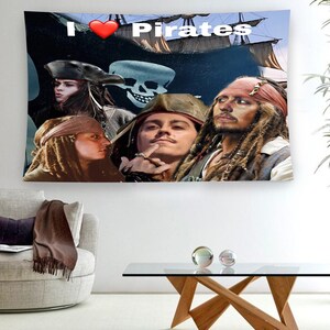 May include: A tapestry featuring a collage of pirates with the text "I &hearts; Pirates". The tapestry includes a red heart, a skull and crossbones, and four pirates with long hair and facial hair.