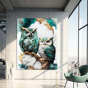 May include: Two owls with gold and teal feathers perched on a branch with a white and gold marble background.