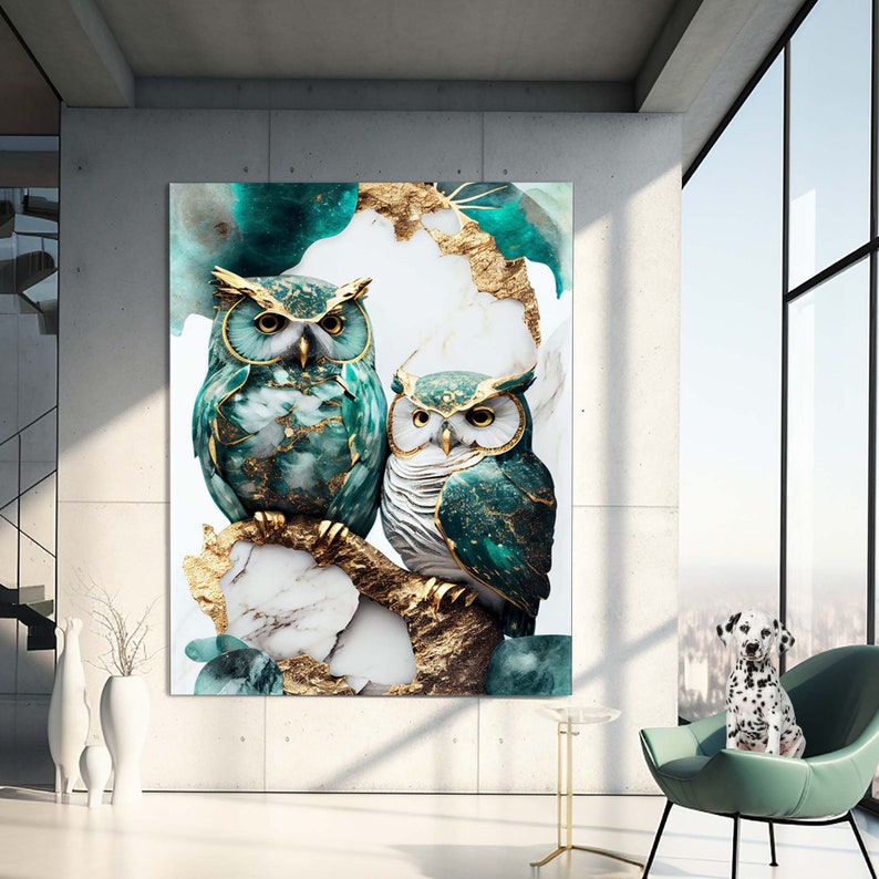 May include: Two owls with gold and teal feathers perched on a branch with a white and gold marble background.