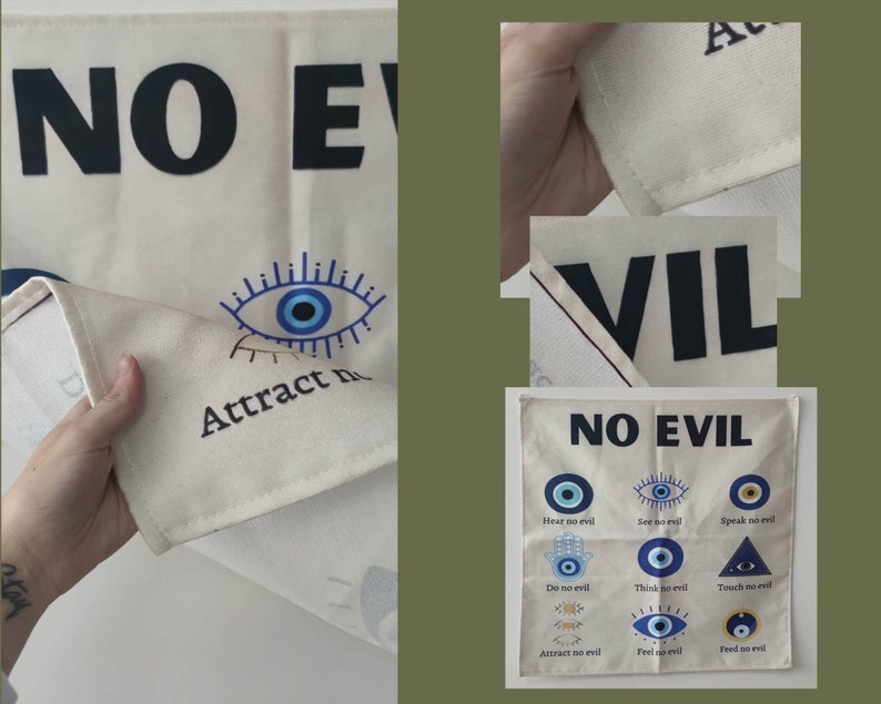 May include: A white fabric wall hanging with the phrase "No Evil" printed in black. The hanging features a blue evil eye design with the text "Attract no evil" printed below. The hanging is also decorated with a series of blue evil eyes with the text "Hear no evil", "See no evil", "Speak no evil", "Do no evil", "Think no evil", "Touch no evil", "Attract no evil", "Feel no evil", and "Feed no evil" printed below each eye.