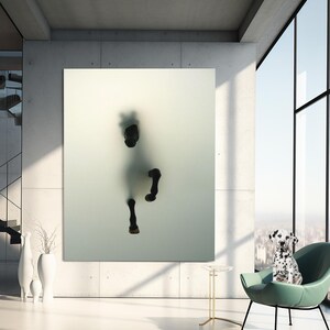 May include: A black horse silhouette is faintly visible through a frosted glass panel, with only the horse's legs and hooves clearly defined. The panel is set against a white wall in a modern interior design setting.