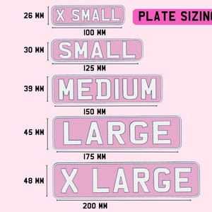 May include: Pink plate sizing guide with measurements in millimeters. Sizes range from X Small to X Large, with dimensions from 100 mm to 200 mm in length. The text "PLATE SIZING" is displayed at the top.