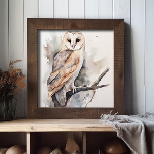 May include: A watercolor painting of a barn owl perched on a branch. The owl has white feathers with brown markings and yellow eyes. The background is a soft watercolor wash of blue and gray.