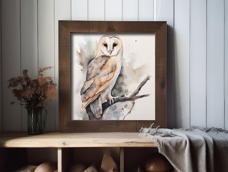 May include: A watercolor painting of a barn owl perched on a branch. The owl has white feathers with brown markings and yellow eyes. The background is a soft watercolor wash of blue and gray.