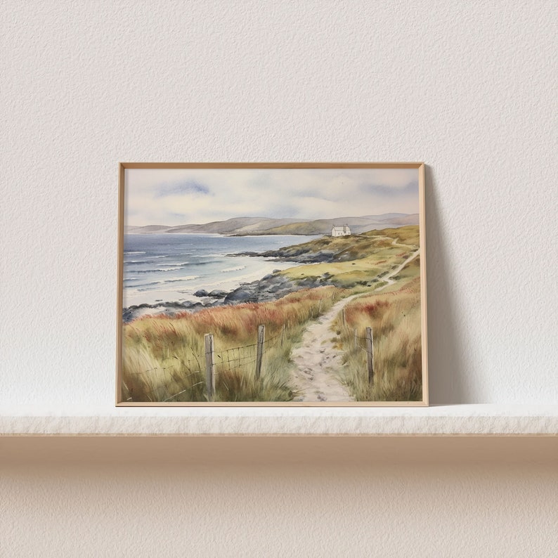 May include: A watercolour painting depicting a path leading to a white house perched on a cliff overlooking a blue sea. The path is bordered by green grass and a wooden fence. The sky is cloudy and the water is choppy.