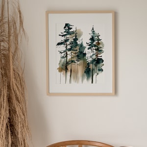 May include: Watercolor painting of a forest scene with tall evergreen trees in shades of green and brown. The artwork is framed in a light wood frame and displayed on a white wall. The painting evokes a sense of nature and tranquility.