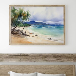 Peut inclure: Une peinture &agrave; l'aquarelle repr&eacute;sentant une sc&egrave;ne de plage tropicale avec des palmiers, un rivage sablonneux et une eau turquoise. La peinture est encadr&eacute;e dans un cadre en bois clair.