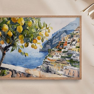 May include: Watercolor painting of a lemon tree with yellow lemons hanging from the branches. The tree is in the foreground of the painting, with a view of a colorful Italian village built into a hillside in the background. The village is on a cliff overlooking the blue sea.