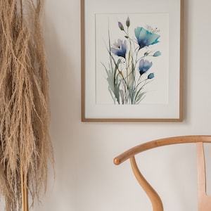 May include: A framed watercolor painting of blue and purple flowers with green stems and leaves on a white background.
