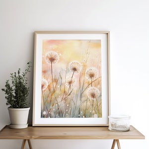 May include: A watercolor painting of a field of dandelions with a soft, yellow and orange background. The dandelions are white and fluffy, and the painting has a delicate and whimsical feel.