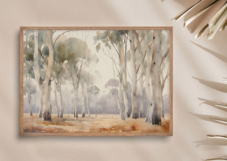 May include: A watercolour painting depicting a forest scene with tall, slender trees featuring white bark. The trees are set against a light grey background with a hint of blue. The painting has a soft, dreamy feel.