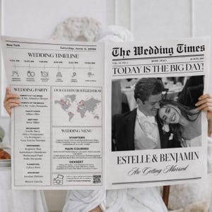 May include: A newspaper-style wedding announcement titled "The Wedding Times" with the headline "Today is the Big Day!" and a black and white photo of a couple. The announcement includes a wedding timeline, party details, and menu.