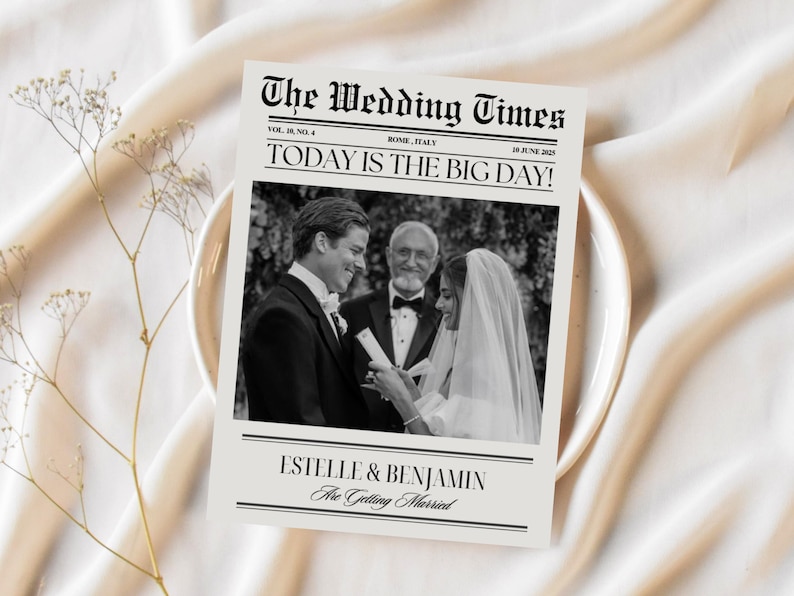 May include: A black and white wedding announcement newspaper clipping with the headline "The Wedding Times" and the text "Today is the Big Day!"  The announcement features a photo of a couple getting married with the text "Estelle & Benjamin Are Getting Married".
