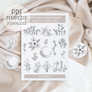 Peut inclure: Modèles de broderie imprimables avec des motifs floraux et lunaires. Les motifs sont en noir et blanc et comprennent une variété de fleurs, de feuilles et de croissants de lune. Le texte "MODÈLES DE BRODERIE IMPRIMABLES" et "FLORAUX" est inclus sur la page.