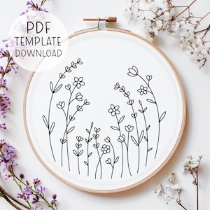 May include: A black and white line drawing of wildflowers in a hoop, with the text "PDF TEMPLATE DOWNLOAD" above the hoop.