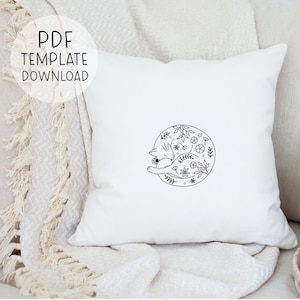 May include: A white pillow with a black line drawing of a cat curled up inside a circle of flowers and leaves. The text "PDF TEMPLATE DOWNLOAD" is in the upper left corner of the image.