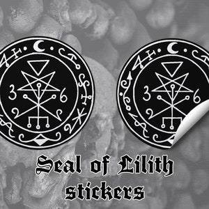 May include: Two black and white stickers with a pentagram and other symbols inside a circle. The text "Seal of Lilith stickers" is below the stickers.