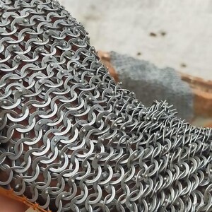 Norse Huscarl reenactment chainmail with gloves and head protection
