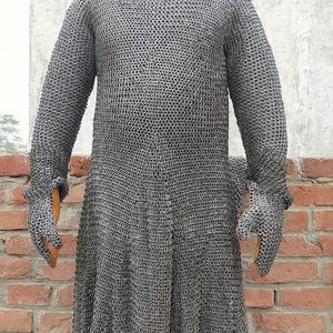 Historical Viking chainmail set displayed on armor stand