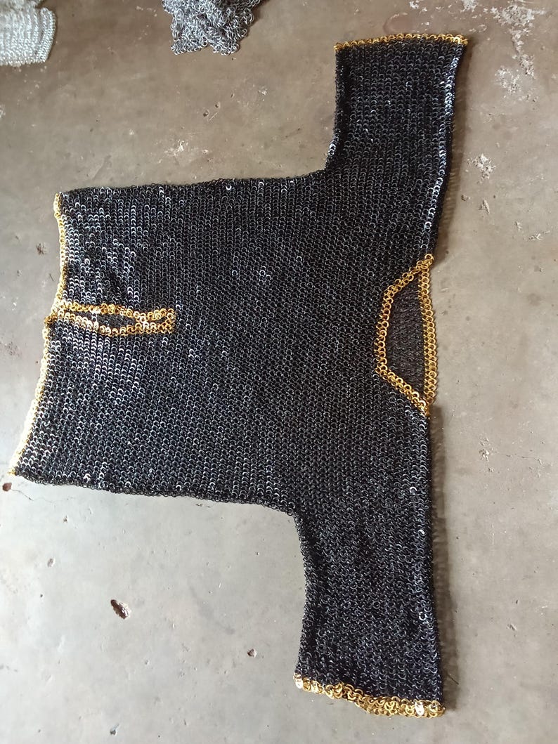 Authentic medieval Viking armor shirt made of 9mm steel rings and brass trim