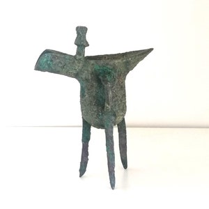 A chinese ritual wine vessel in bronze with chinese charachters  - Free shipping included