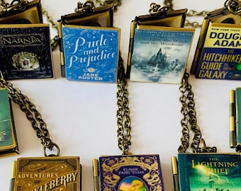 Book locket necklaces, Princess Bride, Huckleberry Finn, Lion Witch & The wardrobe, Watership Down, To kill a Mockingbird, Little Women